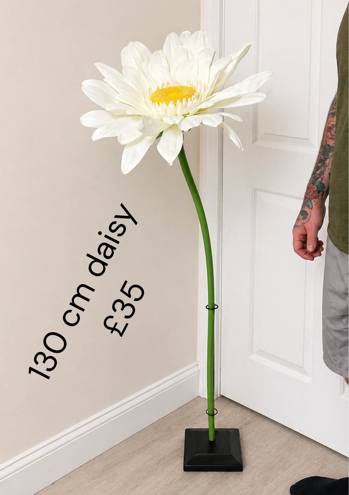 130cm giant white artificial daisy with yellow centre and green stem; display stand not included